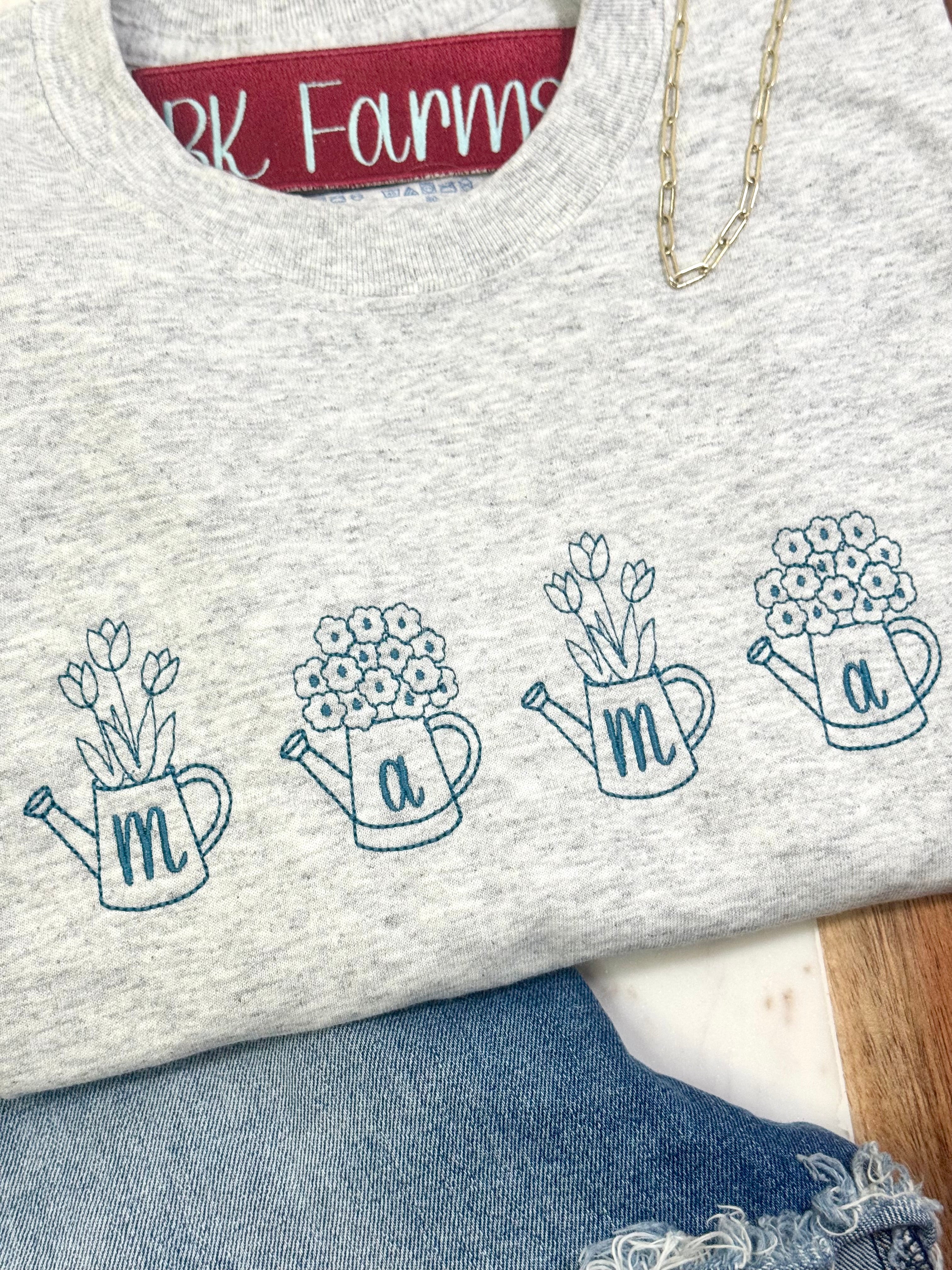 Mama flowers in watering cans tshirt, dusty blue or mauve thread